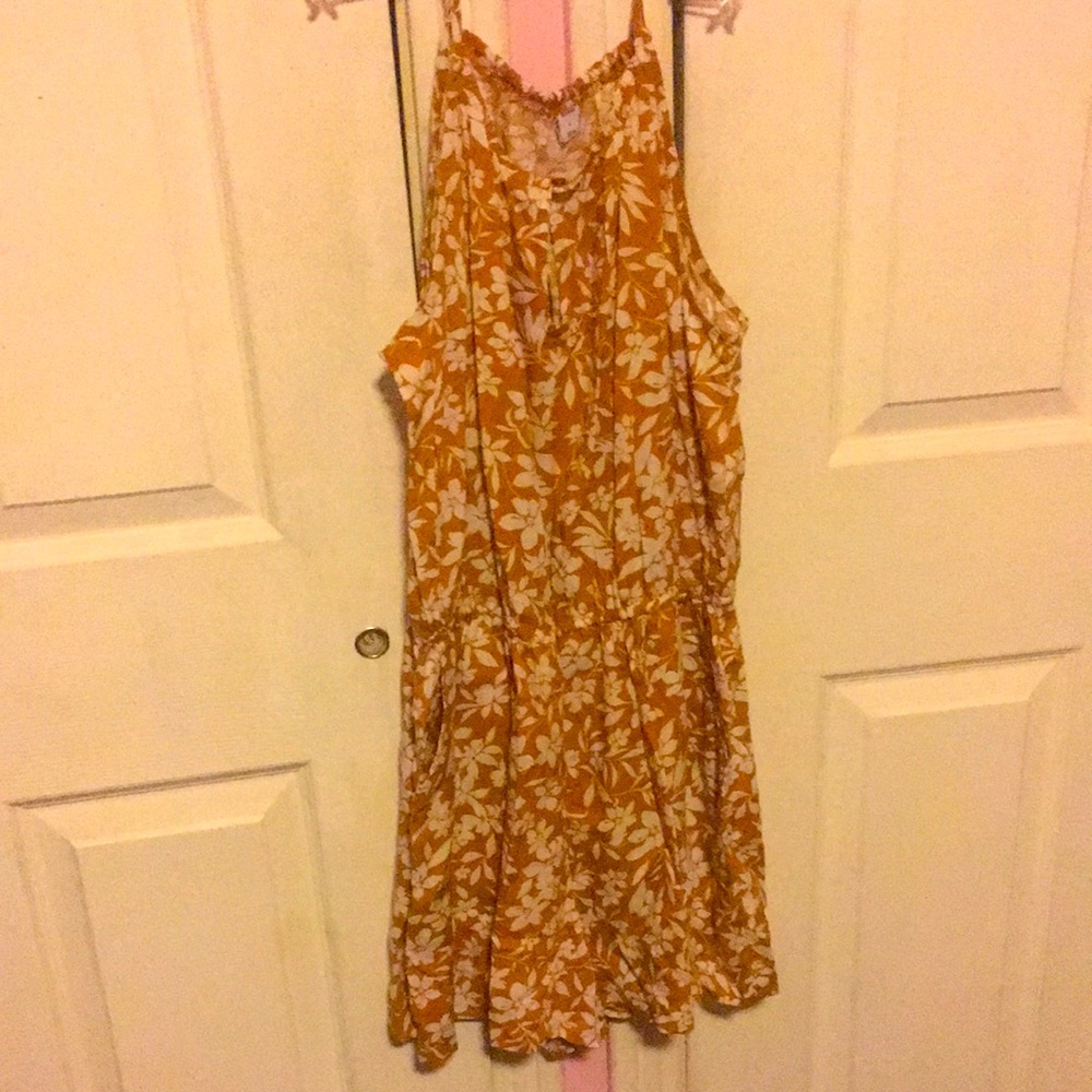 A yellow and white romper